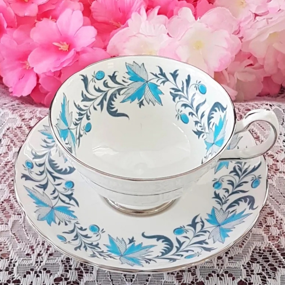 Grosvenor Debutante Tea Cup & Saucer: Blue and White Hand-Painted Bone China